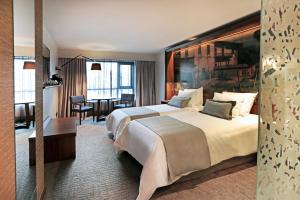Katil atau katil-katil dalam bilik di Hotel Cumbres Lastarria