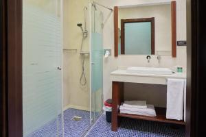 Koupelna v ubytování Hotel Granda