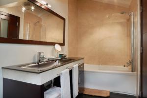 Koupelna v ubytování Hotel Granda
