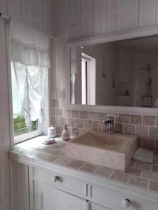 Phòng tắm tại Le Moulin des Roses