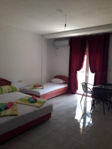 Postel nebo postele na pokoji v ubytování Apartmani Andrea-jaz