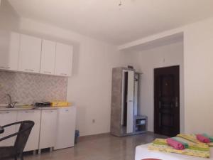 Kuchyň nebo kuchyňský kout v ubytování Apartmani Andrea-jaz