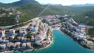 an aerial view of a town next to the water at Villa Obad Guest House in Neum +56 photos