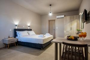 Postel nebo postele na pokoji v ubytování Asteri Apartments und Studios