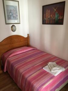 Postel nebo postele na pokoji v ubytování Albergo Meuble Tarandan
