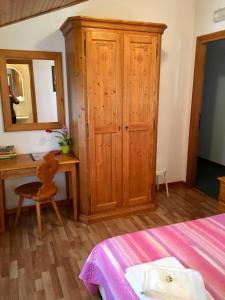Postel nebo postele na pokoji v ubytování Albergo Meuble Tarandan