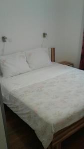 Postel nebo postele na pokoji v ubytování Apartmani Marić