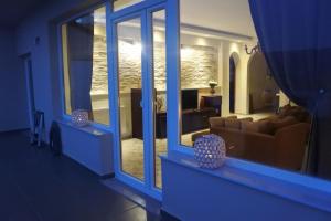 Posedenie v ubytovaní Vai Guesthouse Neraida