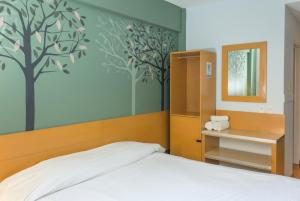 Postel nebo postele na pokoji v ubytování Circus Hostel