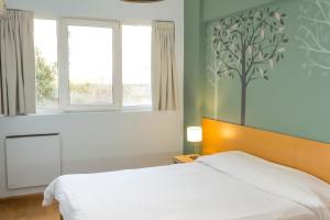 Postel nebo postele na pokoji v ubytování Circus Hostel