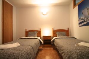 Ένα ή περισσότερα κρεβάτια σε δωμάτιο στο Pont de Toneta 3,2 Ransol, Zona Grandvalira +2 φωτογραφίες