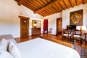 Postel nebo postele na pokoji v ubytování Agriturismo & Cantina Tenuta Casteani