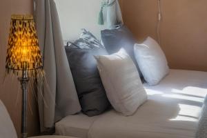 Postel nebo postele na pokoji v ubytování Kastellet Bed & Breakfast