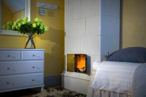 Postel nebo postele na pokoji v ubytování Kastellet Bed & Breakfast