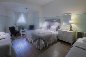 Postel nebo postele na pokoji v ubytování Kastellet Bed & Breakfast