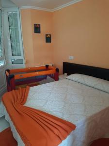 Кровать или кровати в номере Apartamento Ria del Eo