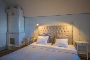 Postel nebo postele na pokoji v ubytování Kastellet Bed & Breakfast