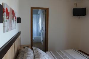 Posteľ alebo postele v izbe v ubytovaní Hotel Estrella del Mar