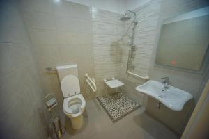 Koupelna v ubytování Hotel Elesio
