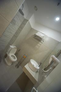 Koupelna v ubytování Hotel Elesio