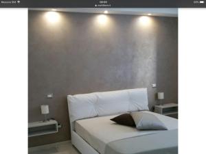 A bed or beds in a room at Ledwars