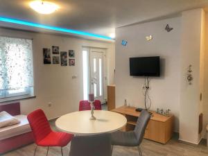 TV a/nebo společenská místnost v ubytování Apartment Futura