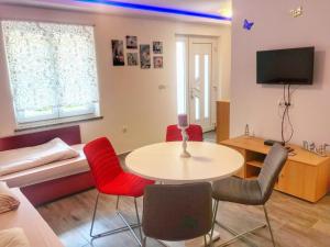 TV a/nebo společenská místnost v ubytování Apartment Futura