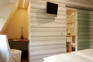 Postel nebo postele na pokoji v ubytování Hotel Zum Bären