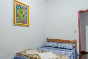 Cama ou camas em um quarto em Caminhos De Ouro Preto
