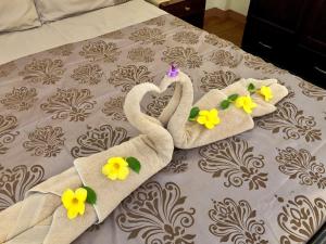 Postel nebo postele na pokoji v ubytování Pal-Watson Apartments