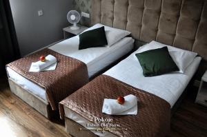 Posteľ alebo postele v izbe v ubytovaní Lublin Old Town Rooms