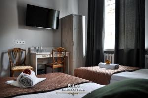 Posteľ alebo postele v izbe v ubytovaní Lublin Old Town Rooms