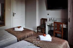 Posteľ alebo postele v izbe v ubytovaní Lublin Old Town Rooms