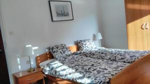 Postel nebo postele na pokoji v ubytování Vila Rosa