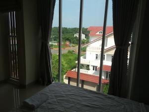 Postel nebo postele na pokoji v ubytování Motel Bao Linh