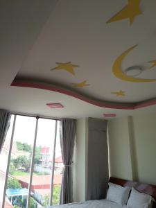 Postel nebo postele na pokoji v ubytování Motel Bao Linh