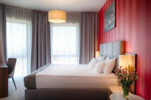 Łóżko lub łóżka w pokoju w obiekcie Focus Hotel Premium Gdańsk