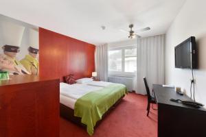 Телевізор і / або розважальний центр в Am Neutor Hotel Salzburg Zentrum