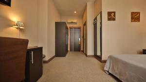 Postel nebo postele na pokoji v ubytování TANA-Boutique Hôtel