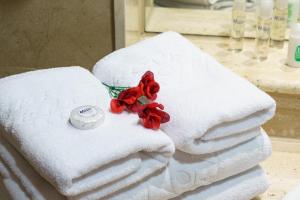 Postel nebo postele na pokoji v ubytování Hotel Isabel