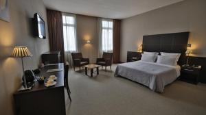 Postel nebo postele na pokoji v ubytování TANA-Boutique Hôtel + 37 fotografií