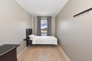 Cama ou camas em um quarto em Måby Park Hotel Arlanda