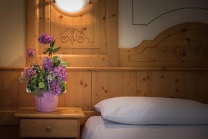 Postel nebo postele na pokoji v ubytování Hotel Astoria