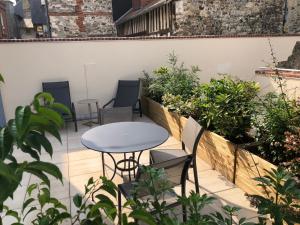 Jardí fora de Les Maisons d'Eugène Appart'Hôtel - Centre Historique