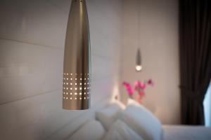 Postel nebo postele na pokoji v ubytování Hotel Astoria