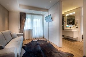 TV a/nebo společenská místnost v ubytování Hotel Astoria
