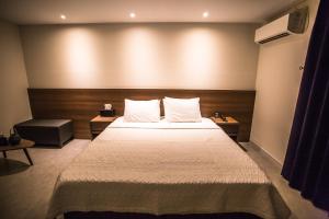 Postel nebo postele na pokoji v ubytování Hotel Egg