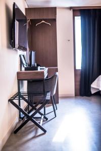 TV a/nebo společenská místnost v ubytování Hotel Egg