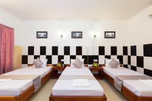 Ένα ή περισσότερα κρεβάτια σε δωμάτιο στο Botoum Hostel +23 φωτογραφίες