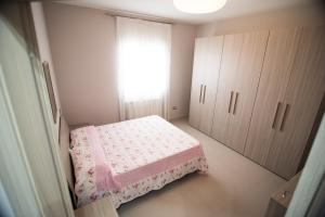 A bed or beds in a room at Casa Vacanza Dal Cavaliere